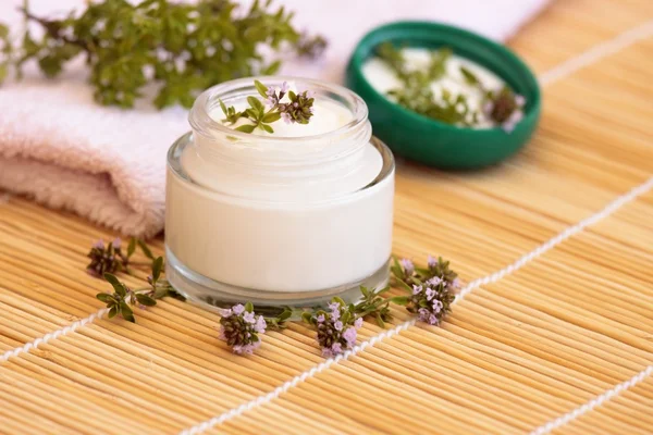Cosmetic cream and thyme — Stock Photo, Image