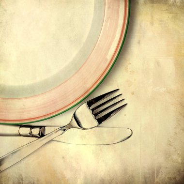 Knife, plate and fork on grunge background clipart