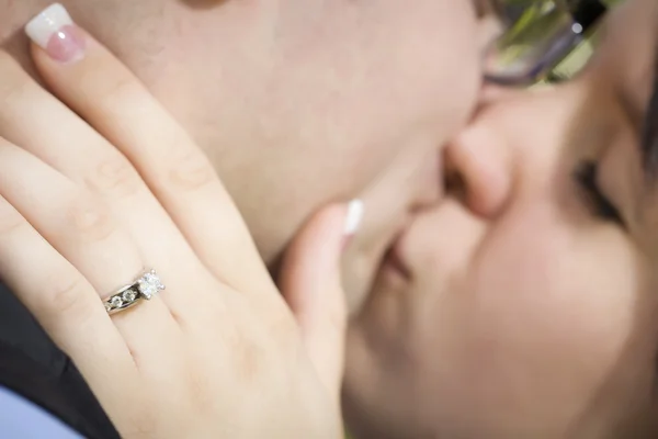 Female Hand with Engagement Ring Touching Fiance's Face — Stock Photo, Image