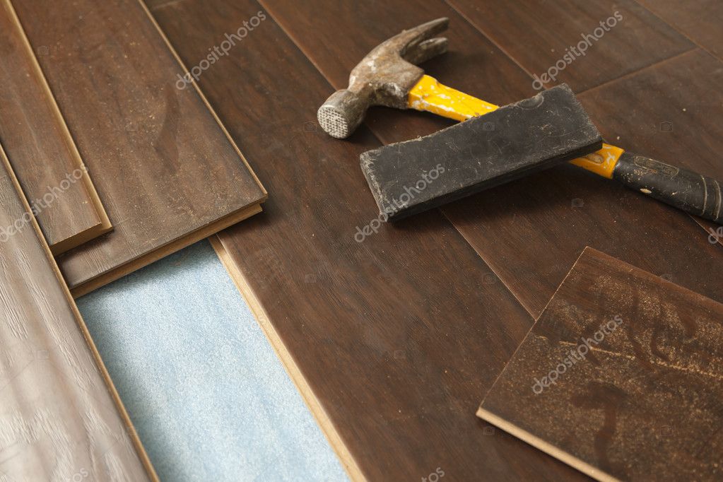 Laminate Flooring Stock Photo, Laminate Flooring Hammer Block