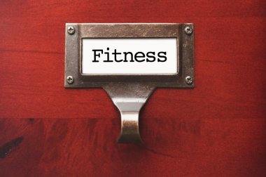 Lustrous Wooden Cabinet with Fitness File Label clipart