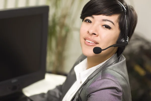 Attractive Young Mixed Race Woman Smiles Wearing Headset — Stock Photo, Image