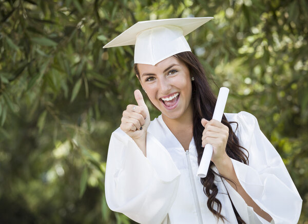 Graduating Mixed Race Girl In Cap and Gown with Diploma