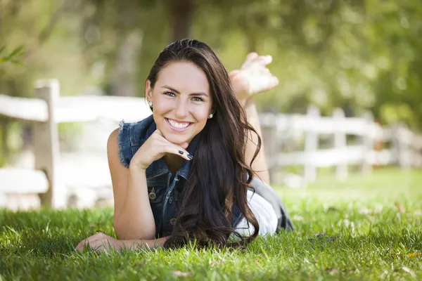 Attractive Mixed Race Girl Portrait Laying in Grass — Stock Photo, Image