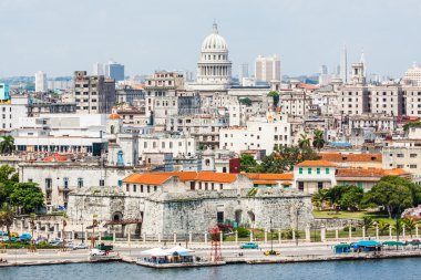 The city of Havana including famous buildings clipart