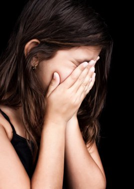 Beautiful girl crying and covering her face clipart