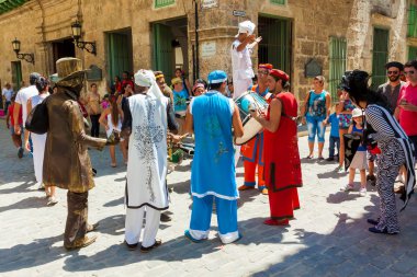 Street entertainers performing in Old Havana clipart