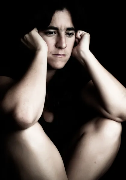 Grunge portrait of a depressed hispanic woman — Stock Photo, Image