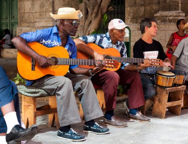 Band playing traditional music in Old Havana clipart