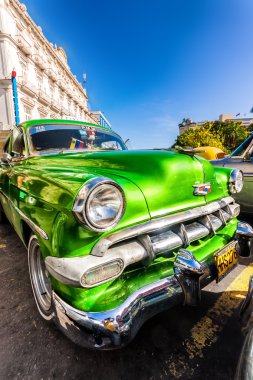 Vintage Chevrolet parked in Old Havana clipart