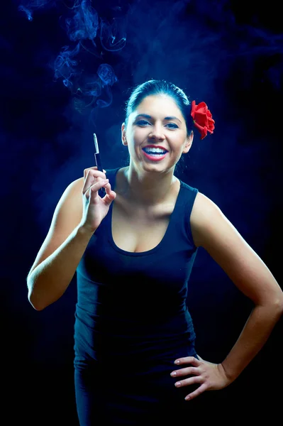 Laughing sexy chiquita with cigarette — Stock Photo, Image