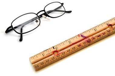 Old Ruler and Glasses for Education clipart