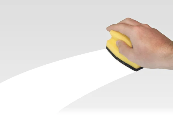 Kéz-a sárga szivacs — Stock Fotó