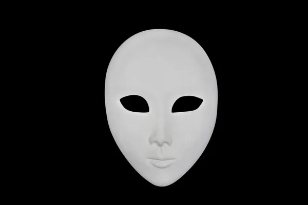 Белая маска на черном — стоковое фото