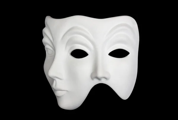Doble cara máscara blanca aislada sobre negro Imagen de archivo