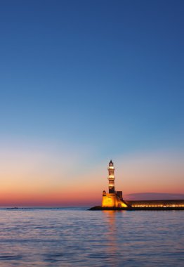 Hania lighthouse at dusk clipart