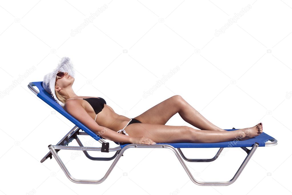 Young blond white woman on sunbed