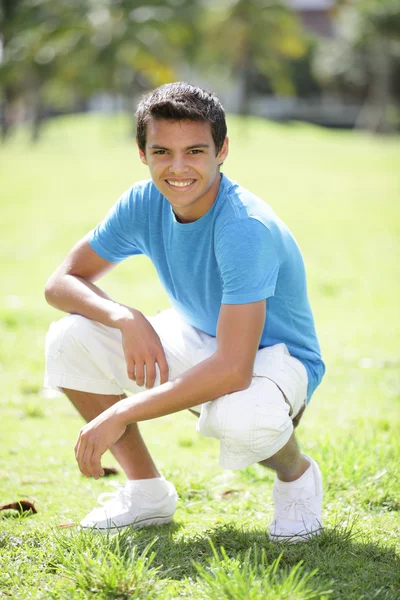 Young male posing in the park — Stock Photo, Image