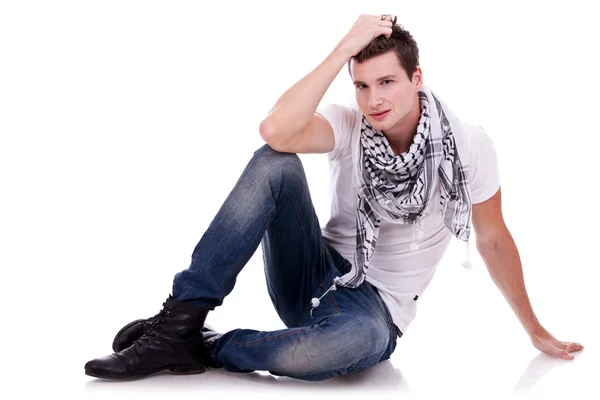 Young casual happy man seated — Stock Photo, Image