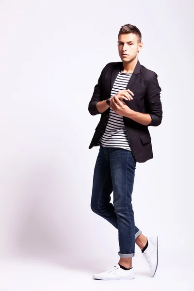 Young fashion man in a pose — Stock Photo, Image