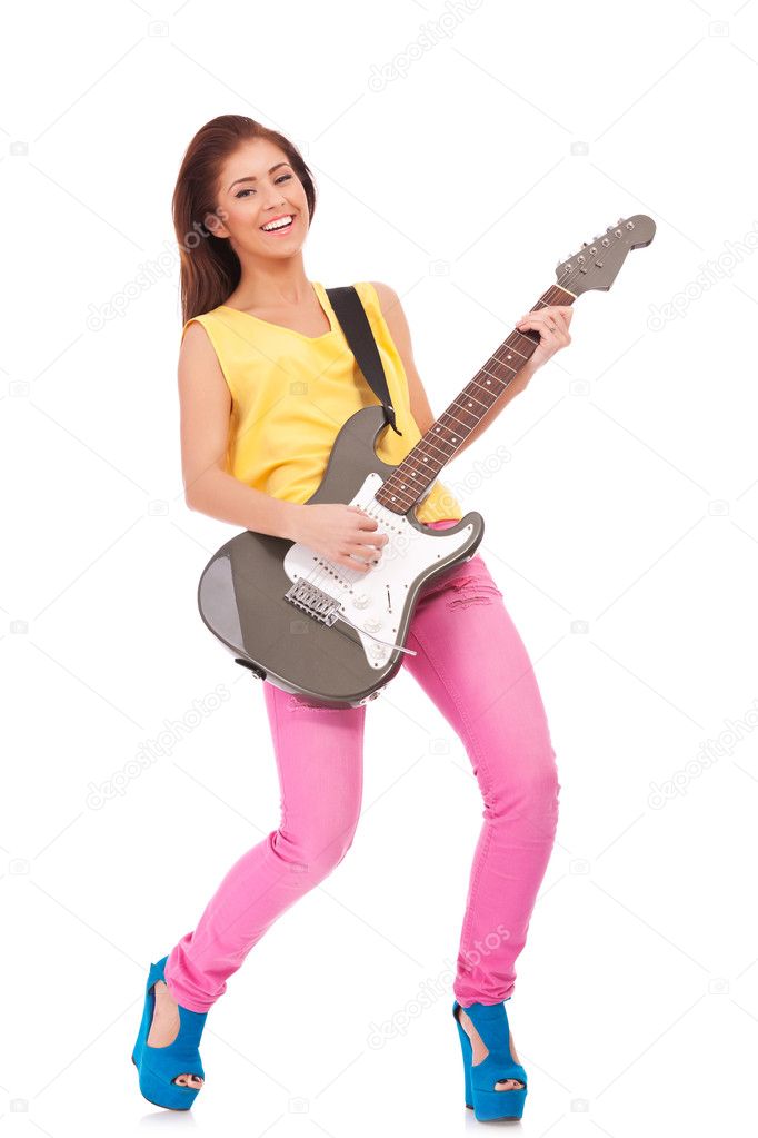 Woman punk rock star playing