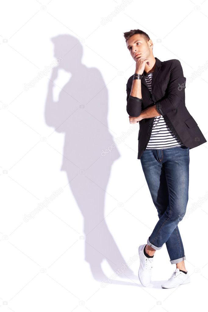 Cool looking shadow of a young casual man