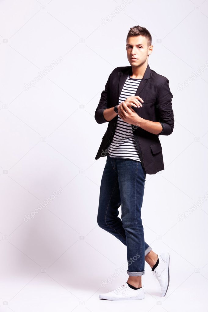 Young Man Make a Funny Pose Stock Photo - Image of human, clothing: 39301092