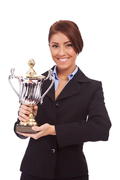 Jovem mulher de negócios segurando seu grande troféu — Fotografia de Stock