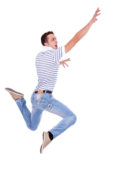 stock image Jumping young casual man