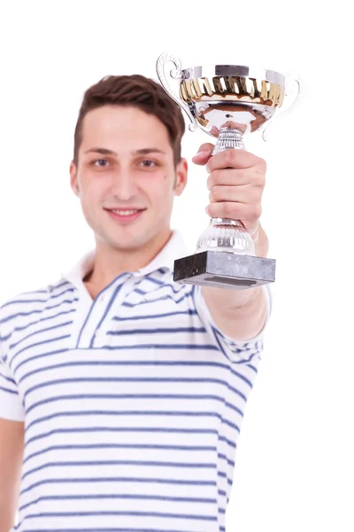 Młody człowiek zdobywając pierwsze miejsce trofeum — Zdjęcie stockowe