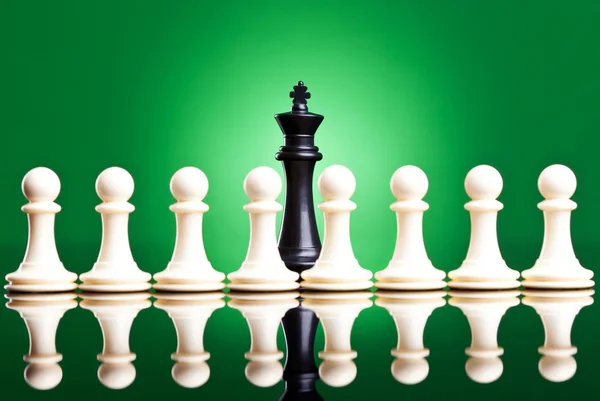 stock image White pawns in front of a black king