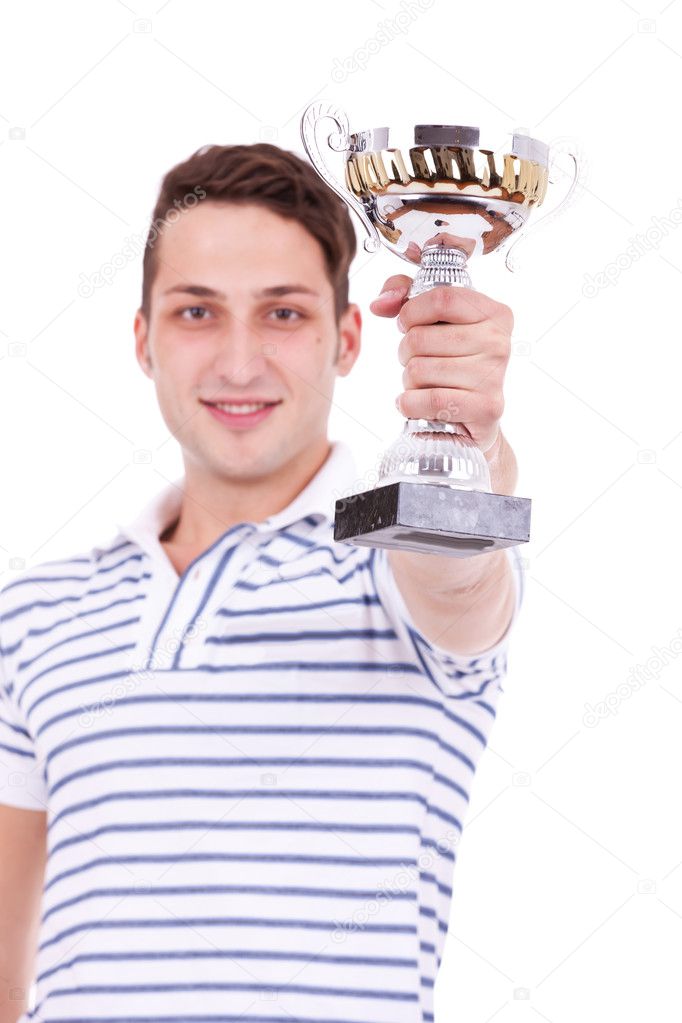 Young man winning the first place trophy