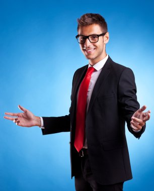 Smiling business man welcoming clipart