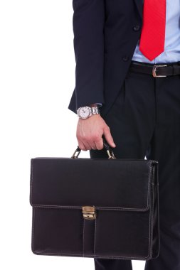 Business man in black suit hand holding briefcase clipart