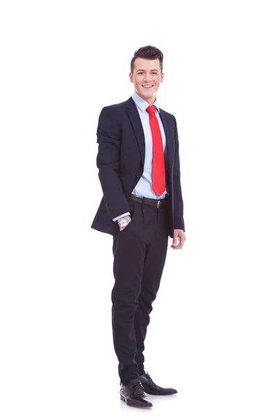 Business man standing with hand in pocket — Stock Photo, Image