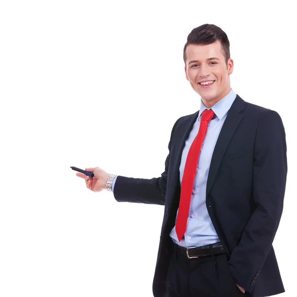 Business man i kostym pekar med en penna — Stockfoto