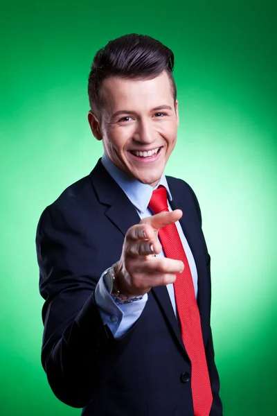 Young business man points finger — Stock Photo, Image