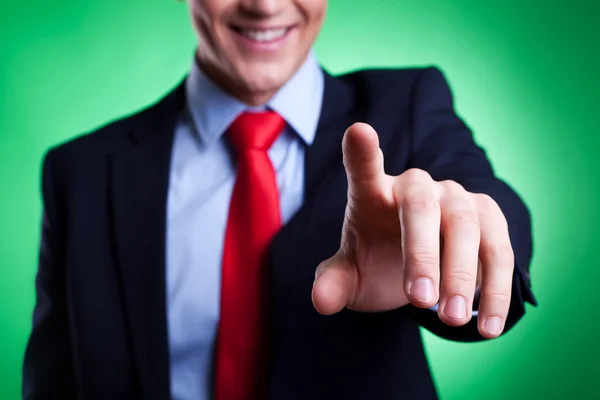 Business man pressing an imaginary button — Stock Photo, Image