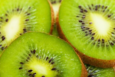 Many slices of kiwi fruit clipart