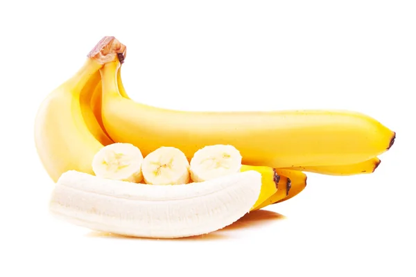 Zralé banány, izolované na bílém — Stock fotografie