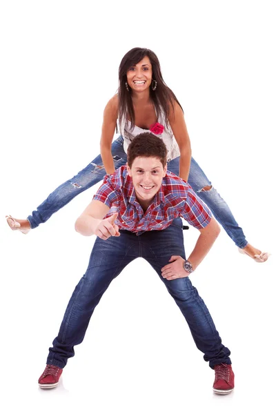 Woman jumping on her boyfriend's back — Stock Photo, Image