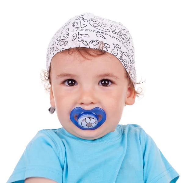 Adorable little kid holding his pacifier — Stock Photo, Image