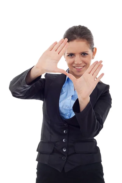 Giovane donna d'affari che fa telaio con le mani — Foto Stock