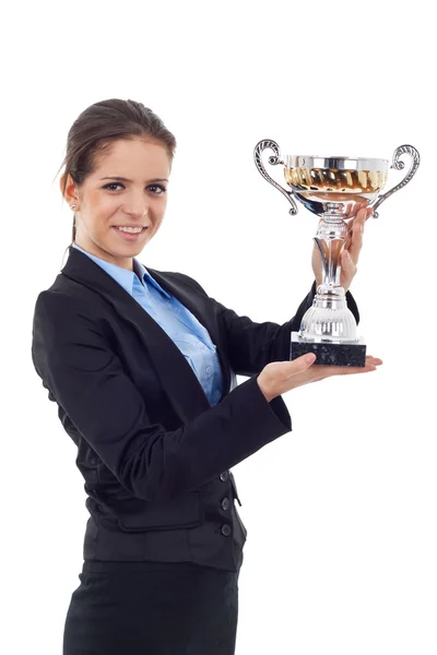 Jovem mulher de negócios segurando um troféu — Fotografia de Stock
