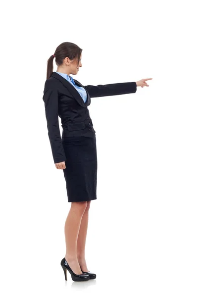 Junge Geschäftsfrau zeigt mit linker Hand — Stockfoto