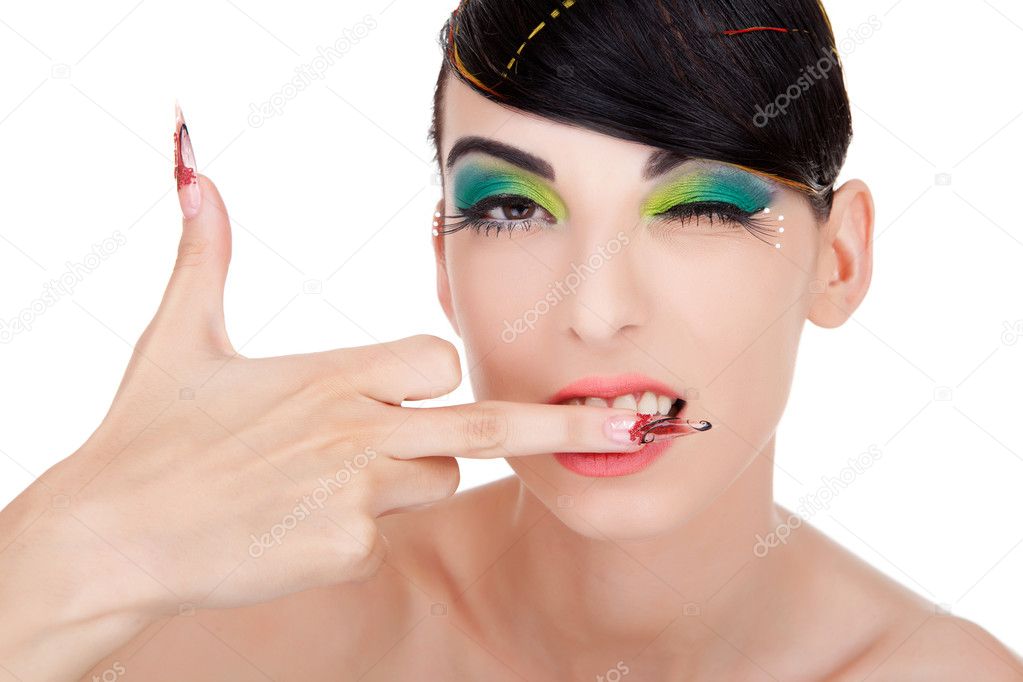 Model with long fancy nails showing middle finger