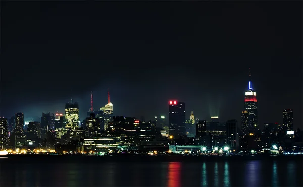 Manhattan from Hudson river at night — Stock Photo, Image