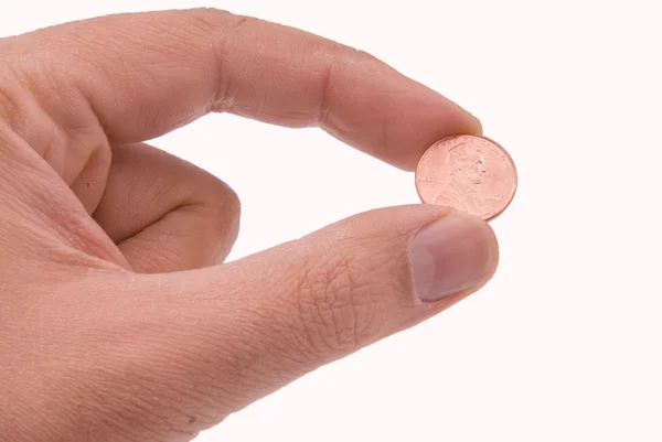 Mince držené dvěma prsty — Stock fotografie
