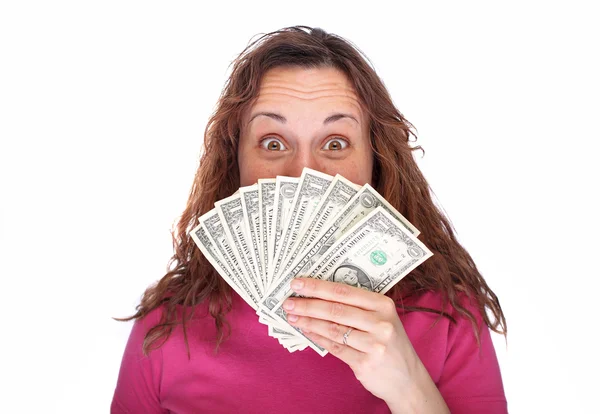 Kvinna gömmer sig bakom pengar — Stockfoto