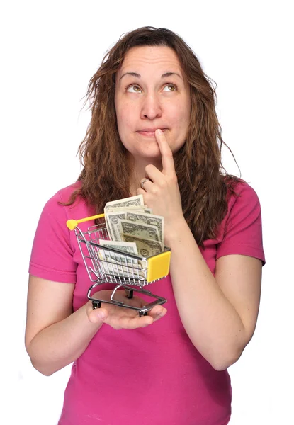 Задумчивая женщина с деньгами — стоковое фото